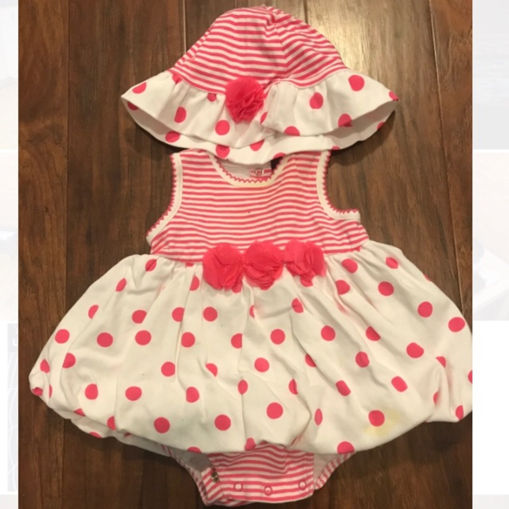 Dress onesie and hat.
